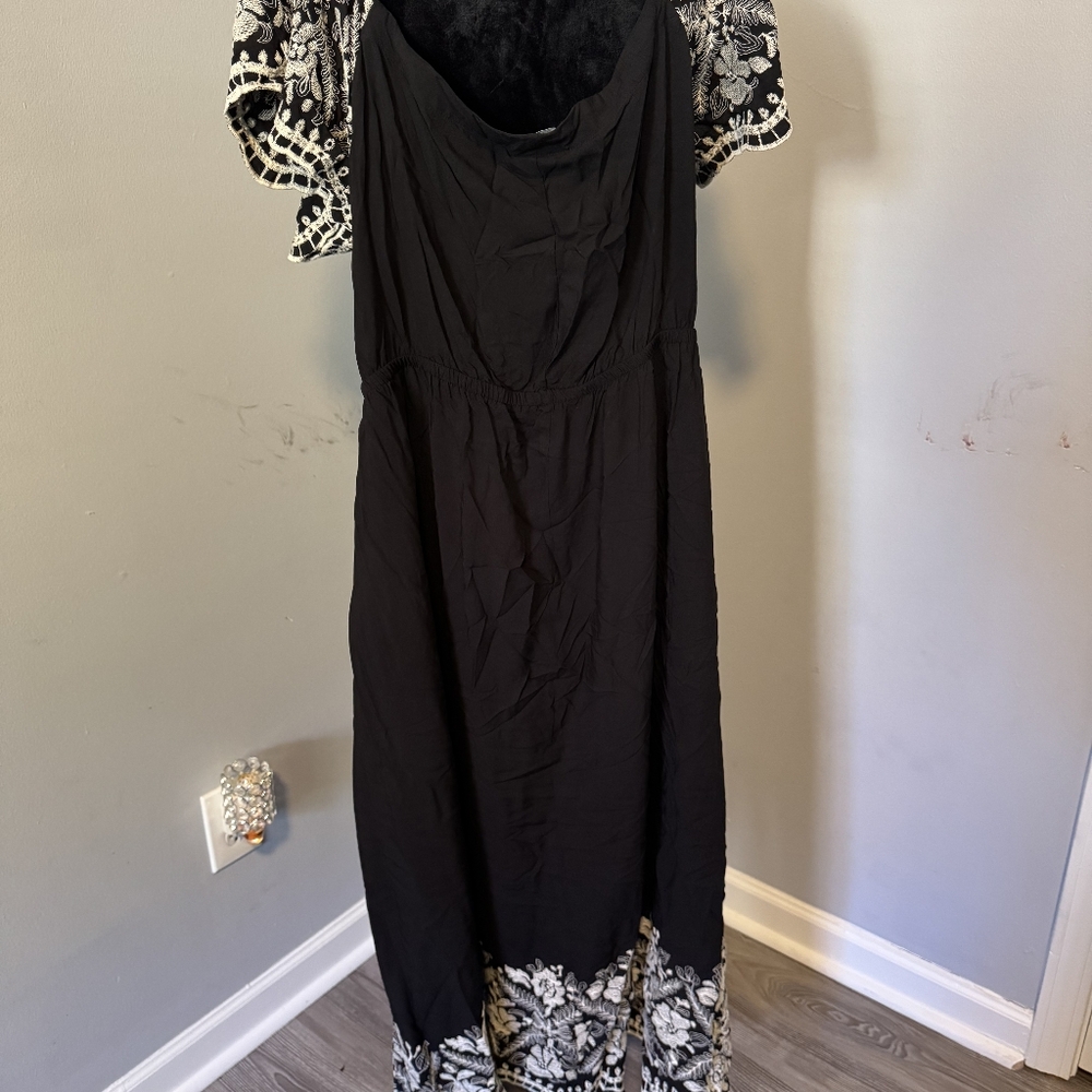 Black Cocktail Dress with Lace Sleeves and Bottom Fringe